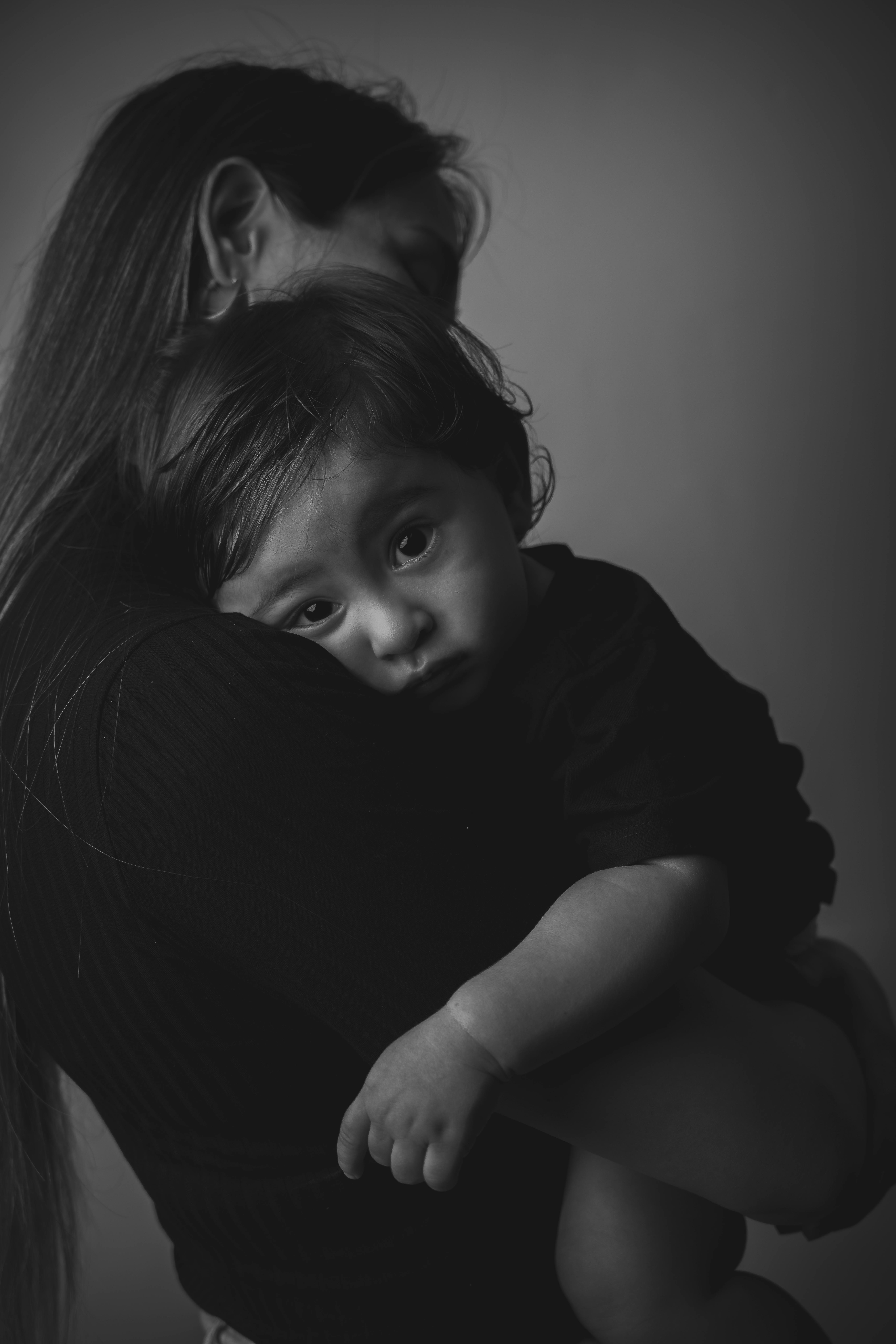 Affectionate Child Hugging Parent Black and White: How to Capture This Powerful Love in Photography